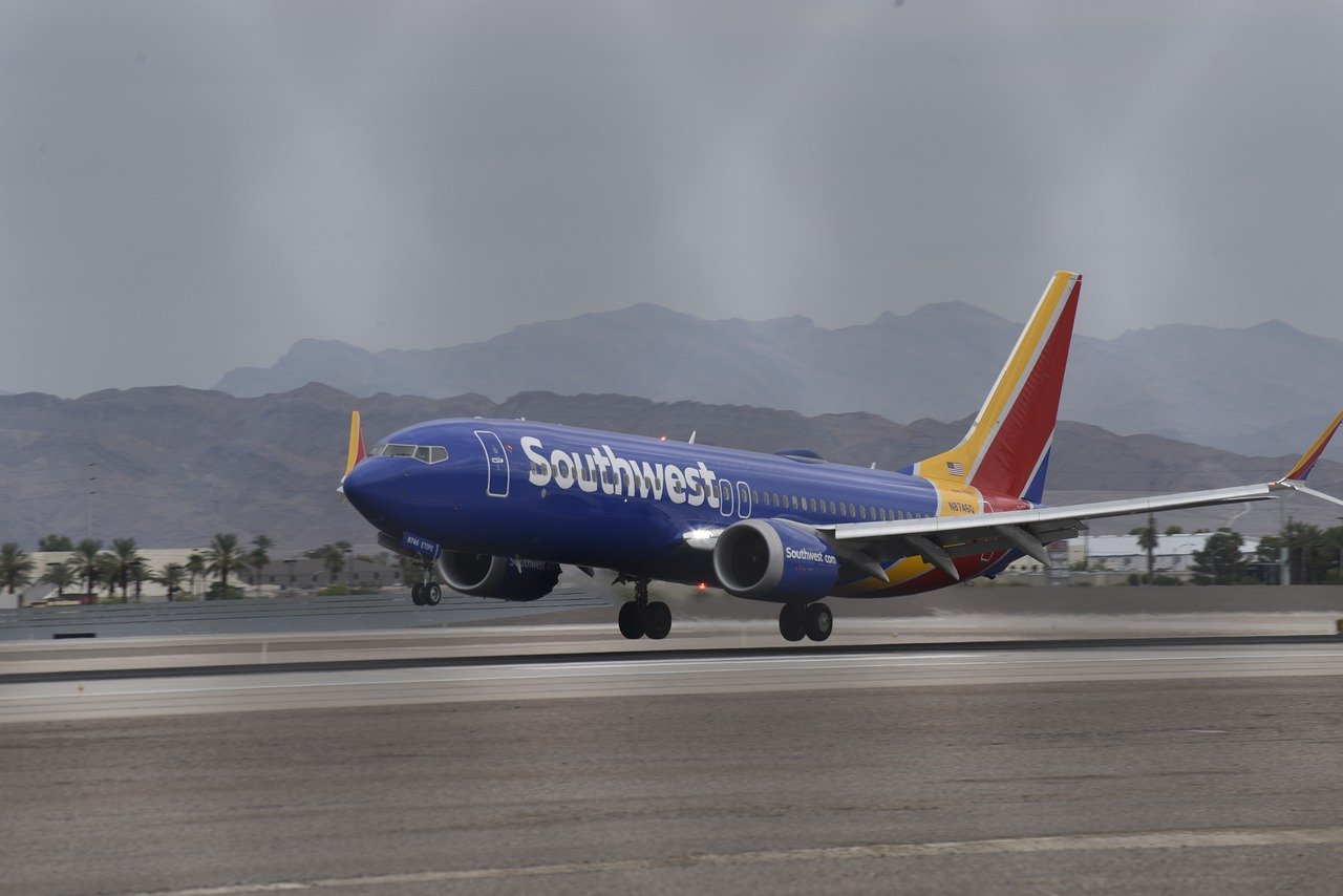 A plane touches down at Harry Reid International Airport